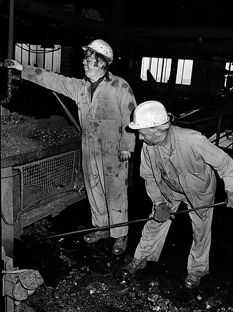 Workers at Maesteg Washery process coal after the pits around them had closed. 1985