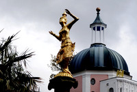 The Gold Statue with the Round House behind