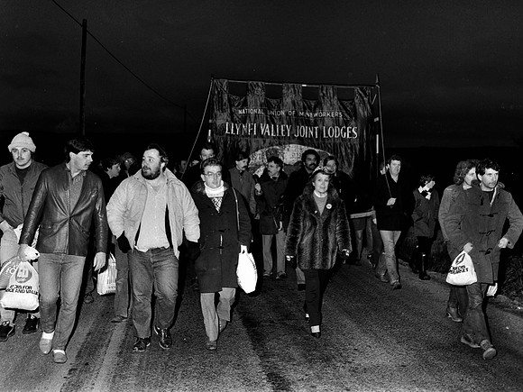 Marching back to St John's Colliery Maesteg, Campaigner and 'Miners' champion' Vi John in centre.