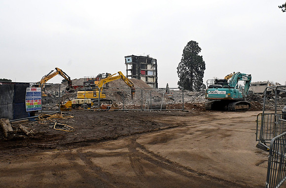 Diggers clearing the thousands on tons of rubble