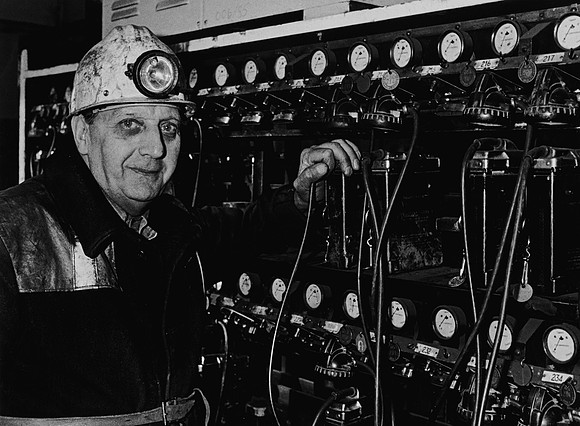 'Hitcher' Norman Davies takes his power pack on the last day of coal production at Coegnant Colliery