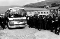 Police clear a path for a bus carrying strikebreaker Monty Morgan. August 1984